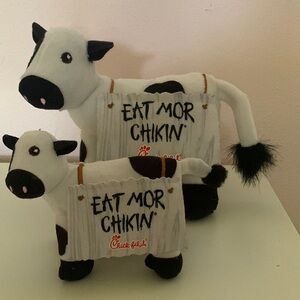 Two Chick-Fil A Cow Plushies